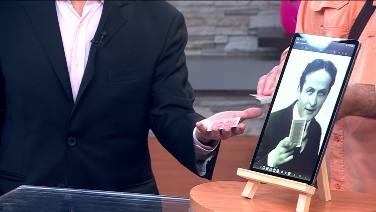 David Farr performing a magic illusion in Edina